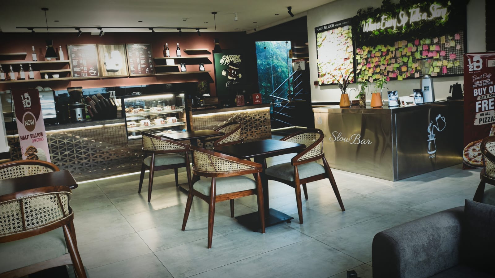 Half Billion Coffee House interior with cane chairs and the Slow Bar counter
